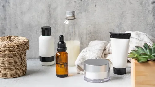 Personal care product packaging including shampoo bottles, lotion pumps, and shower gels filled by automatic machines